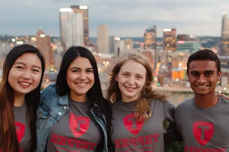 CMU Tepper School fo Business students on Mt. Washington overlooking the Pittsburgh city skyline